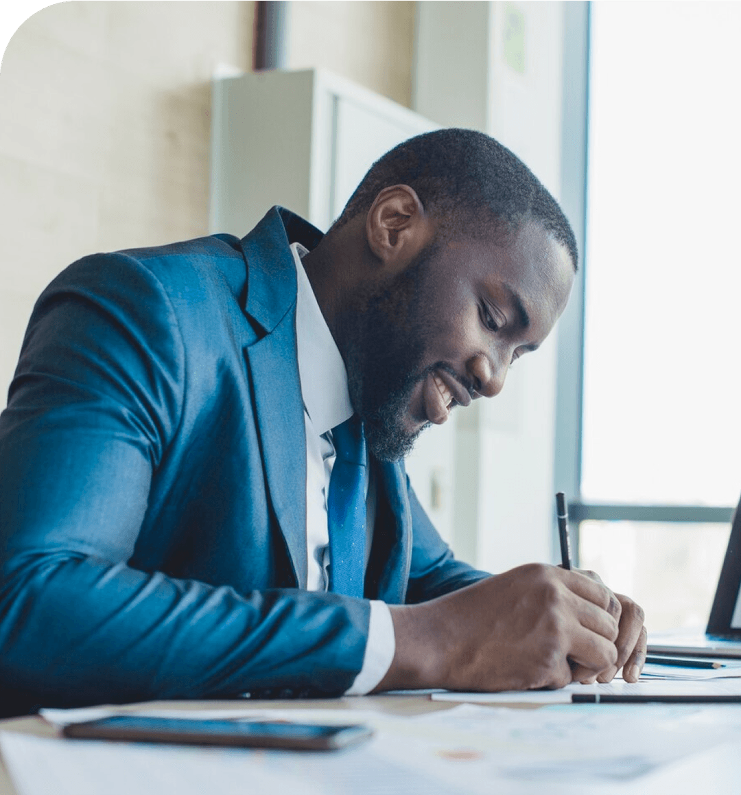 man filling document